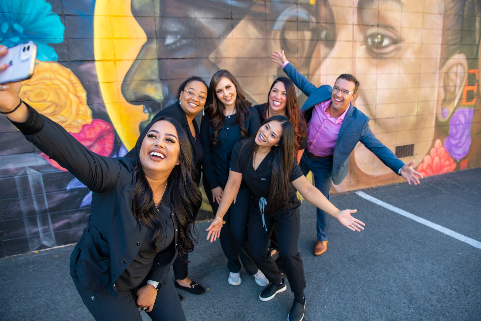 a joyful dental practice staff photo