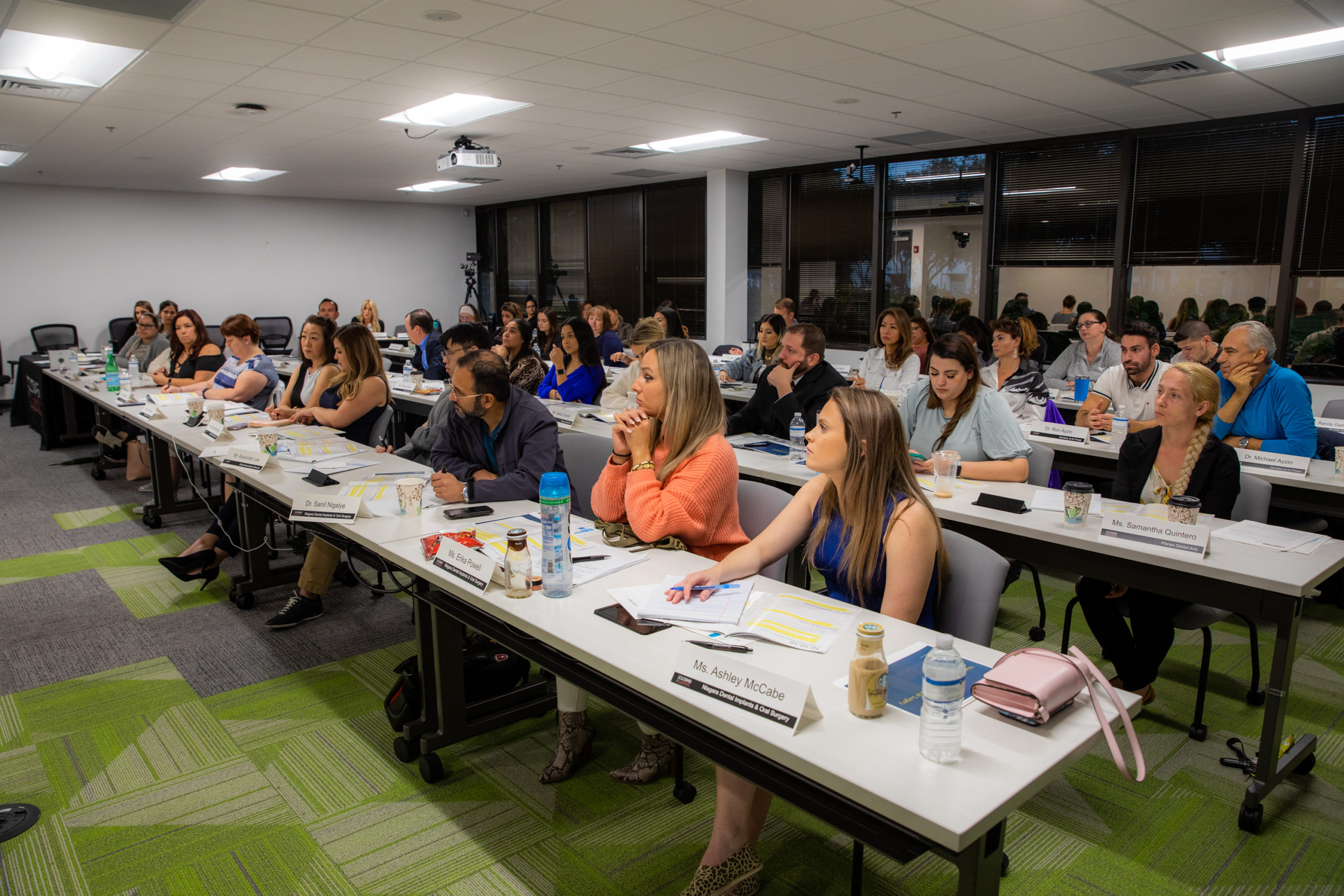 a closing institute session in progress at the progressive dental office