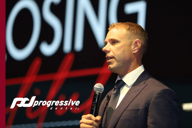 ceo bart knellinger speaking at the tci miami course in 2022.|full arch conference check in table at tci miami 2022.|tci signage at tci miami 2022.|a dental patient looking for care online using social media.