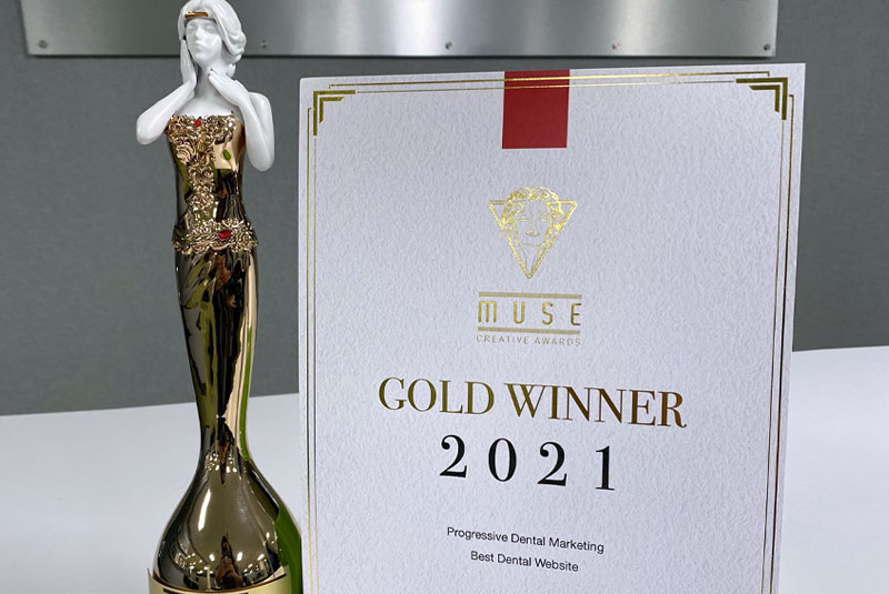 MUSE Creative Awards Gold Trophy For Progressive Dental's SmilesThatRock.com Website Build