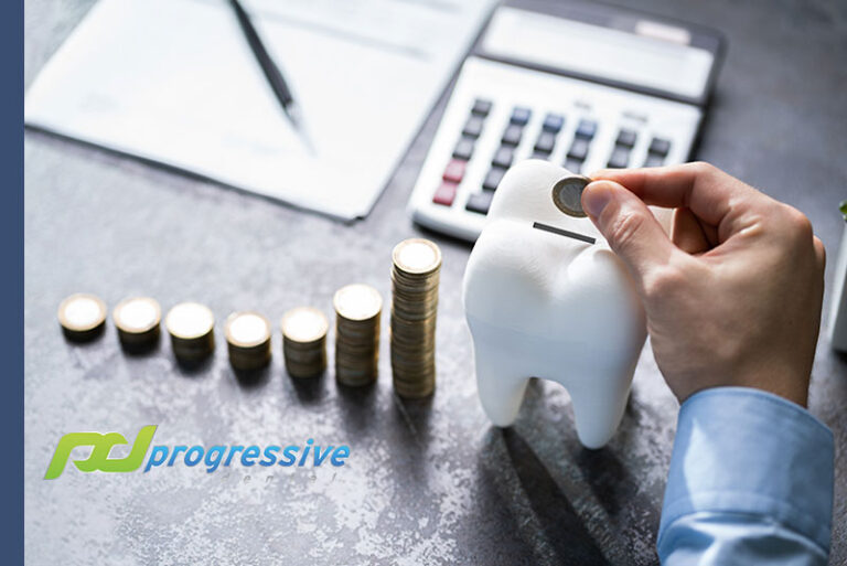 a dental professional balancing income.|a dental professional balancing accounts.|