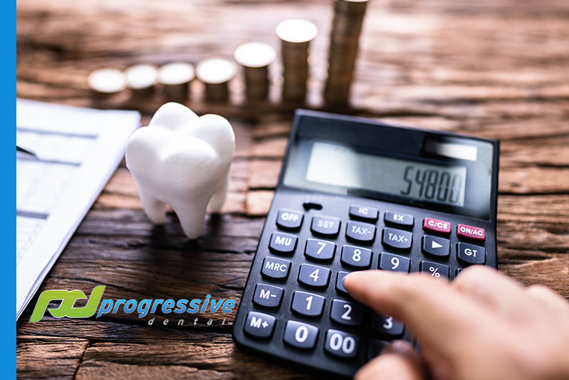 a dental professional balancing accounts for q4.||