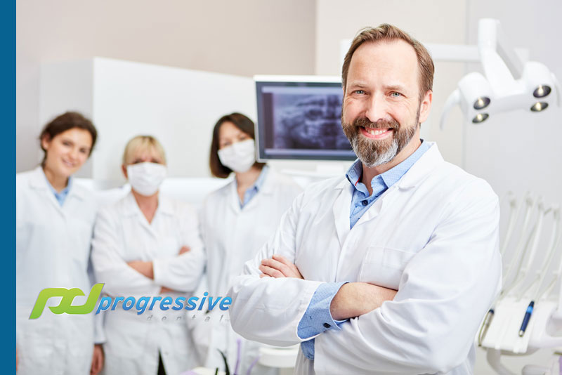 a group of dental professionals getting ready for success.|a dental patient calculating dental costs and budget.|two dental professionals discussing their clients motivations for dental implant surgery.