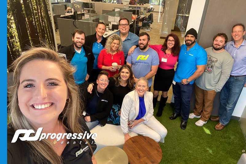 the progressive dental team having fun in the green room at the home office.|the progressive dental team during kickball